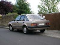 Ford Escort Hatchback 5-door. (3 generation) 1.6 5MT (79 HP '83) foto, Ford Escort Hatchback 5-door. (3 generation) 1.6 5MT (79 HP '83) fotos, Ford Escort Hatchback 5-door. (3 generation) 1.6 5MT (79 HP '83) imagen, Ford Escort Hatchback 5-door. (3 generation) 1.6 5MT (79 HP '83) imagenes, Ford Escort Hatchback 5-door. (3 generation) 1.6 5MT (79 HP '83) fotografía